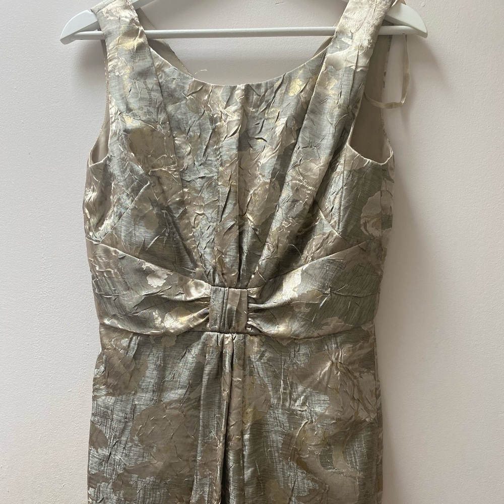 Stunning New unworn gold sleeveless dress